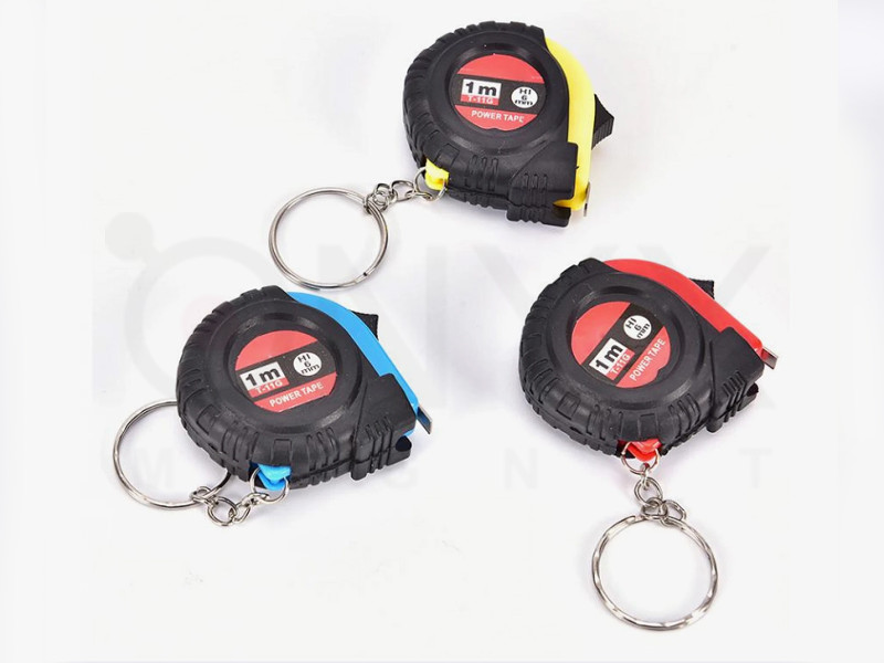 Брелок Рулетка прогумована 1 метр кольорова 08021 Брелок Рулетка прогумована 1 метр кольорова 08021